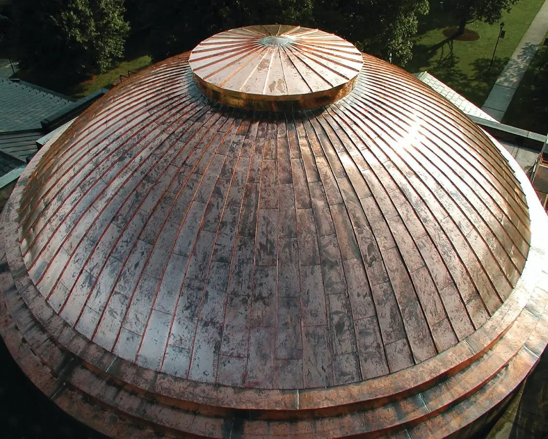 Craftsman Roofing crew installing a new roof in The Towneship